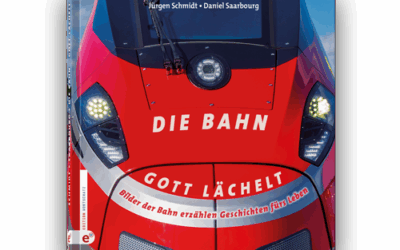 Neues Buch: Die Bahn – Gott lächelt. Bilder der Bahn erzählen Geschichten fürs Leben